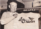 1938 Press Photo HOF Rogers Hornsby Shows his New Balitmore Orioles Uniform — photo 1