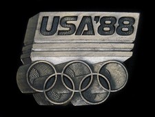 TA13167 NOS VINTAGE 1988 USA OLYMPIC GAMES SPORTS COMMEMORATIVE BELT BUCKLE