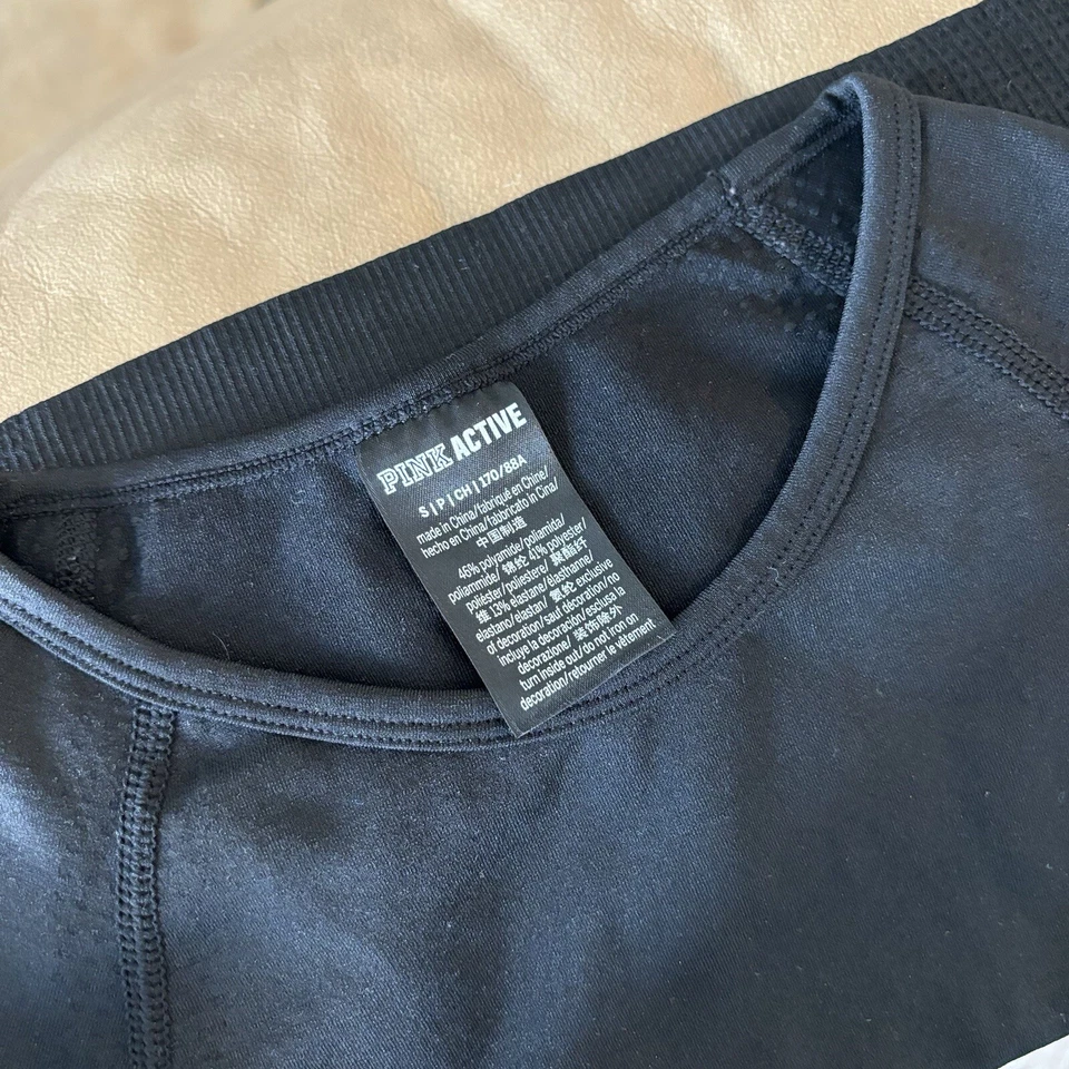 Top corto Victoria’s Secret ROSA activo manga larga negro talla pequeña. Gimnasio deportivo Foto 2 de 4