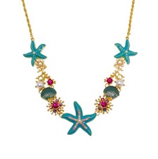 Ocean theme charm necklace with starfish, shell charms and mixed with crystals