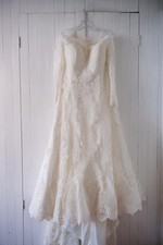 Justin Alexander long sleeve A-line lace wedding dress Style 99166