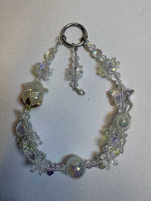 White rose-shaped star phone charm