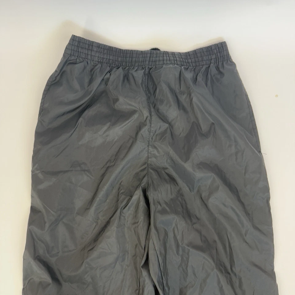 Pantalones cortavientos de colección Club Athlete negros pierna a presión talla M nailon poliuretano Foto 3 de 4