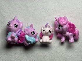Hatchimals collEGGtibles Unicron Family Rainbow-cation Play Set 9 pcs plus Case