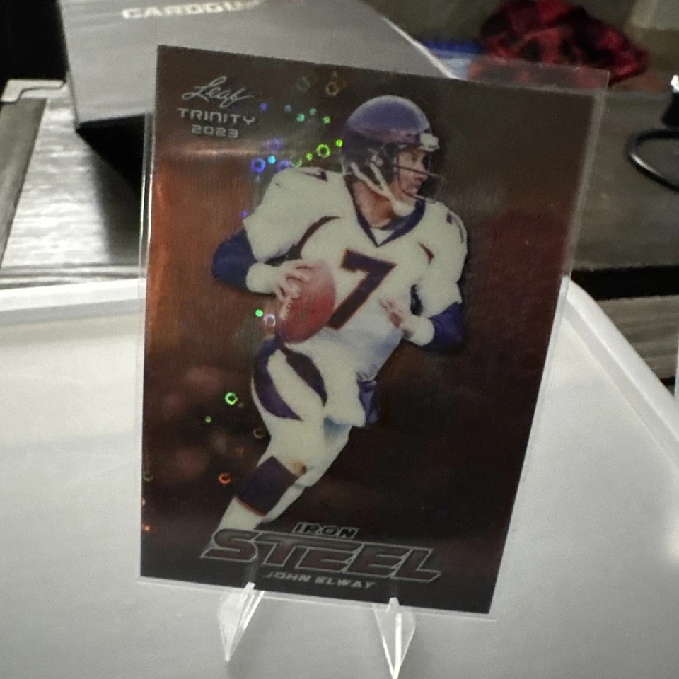 Hoja Trinity 2023 - Trinity Steel John Elway #S-50 círculos de rosquilla naranja/6 Foto 3 de 3