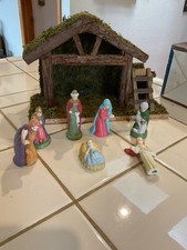Seven Piece Ceramic Nativity Set With Wood Moss Stable