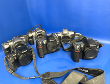 AS IS LOT OF X6 NIKON / CANON / AND MORE SLR CAMERAS / UNTESTED