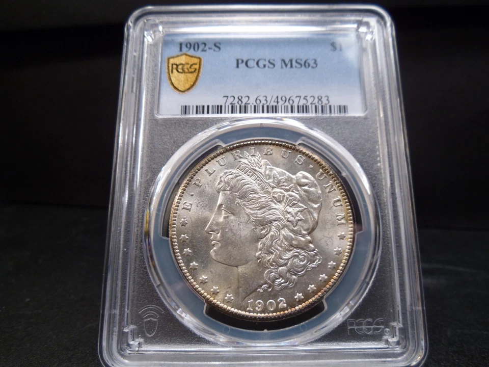 Dólar de plata Morgan 1902-S MS63 certificado PCGS - soporte escudo dorado