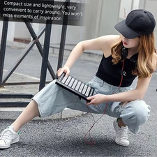 WORLDE Portable USB MIDI Drum Pad Controller 64 Pads RGB Backlit 24 Buttons RVEQ