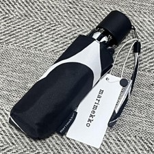 Unused with tags Marimekko Unikko pattern compact folding umbrella black