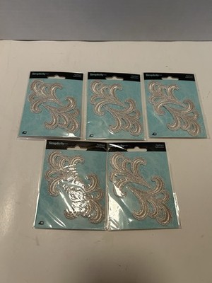 Simplicity silver embroidered iron-on appliques; Lot Of 5 Packs. NEW.
