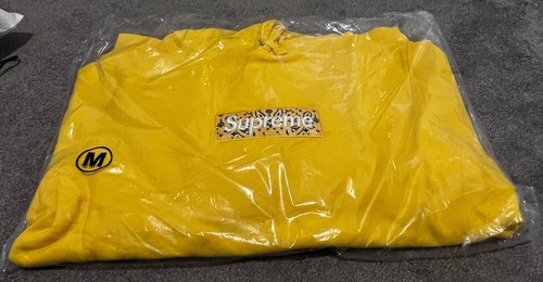 yellow bandana box logo