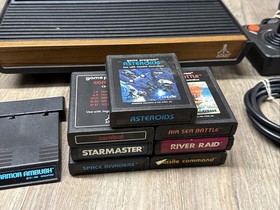 Atari 2600-A Video Computer System Console Black/Brown w/ 8 Games