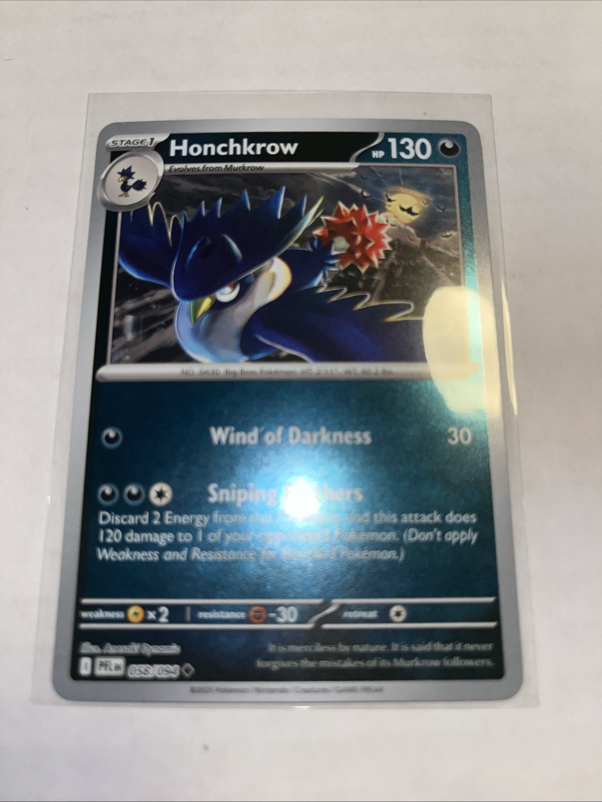 Honchkrow 058/094 Me02: Phantasmal Flames Reverse Holo