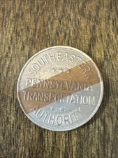 GOOD FOR ONE FARE SOUTHEASTERN PENNSYLVANIA TRANSPORTATION AUTHORITY TOKEN COIN.