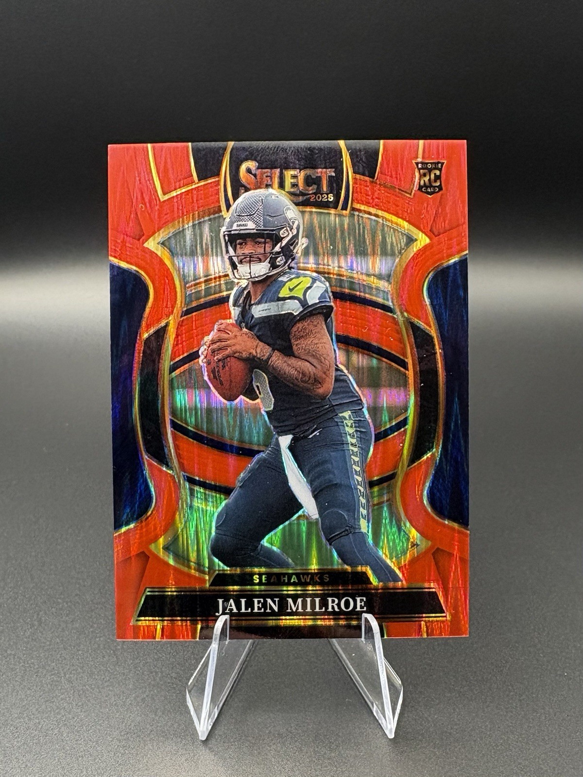 2025 Panini Select Jalen Milroe Red Shock Concourse Prizm /249 RC Seahawks