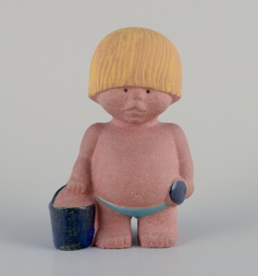 Lisa Larson for Gustavsberg. Stoneware figurine of a boy with a bucket.