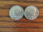 1964 Kennedy half dollar i 90% silver 1967 Kennedy half dollar 40% one each