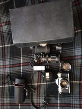 Vintage Sears TLS camera with Original Case 2 lenses, flash and booklet.
