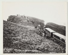 PHOTO OF PASSENGERS ON TRAIN AT MCCLELLAN MT FROM NEGATIVE ON PHOTO PAPER