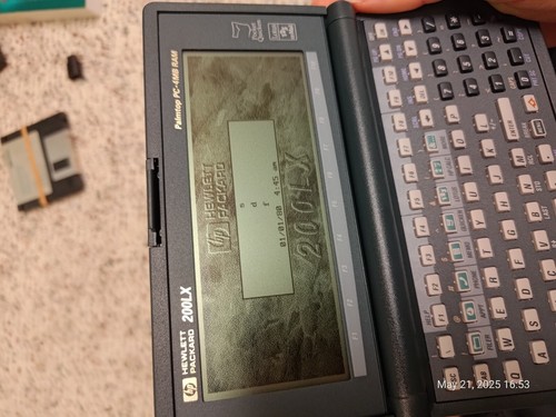 Hewlett Packard HP 200LX 4MB RAM PDA Palmtop PC w power adapter floppies cables - Photo 2 sur 24