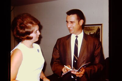 Vintage slide photograph  Stylish Duo Engaging in Conversation During the Past
