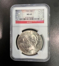 1923-P | PEACE SILVER DOLLAR | NGC MS63 | BLAST WHITE | AAA | INSURED