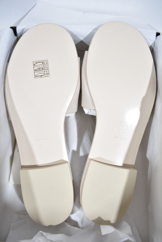 Chanel 23P Ivory White Leather CC Logo Letter Mules Slide