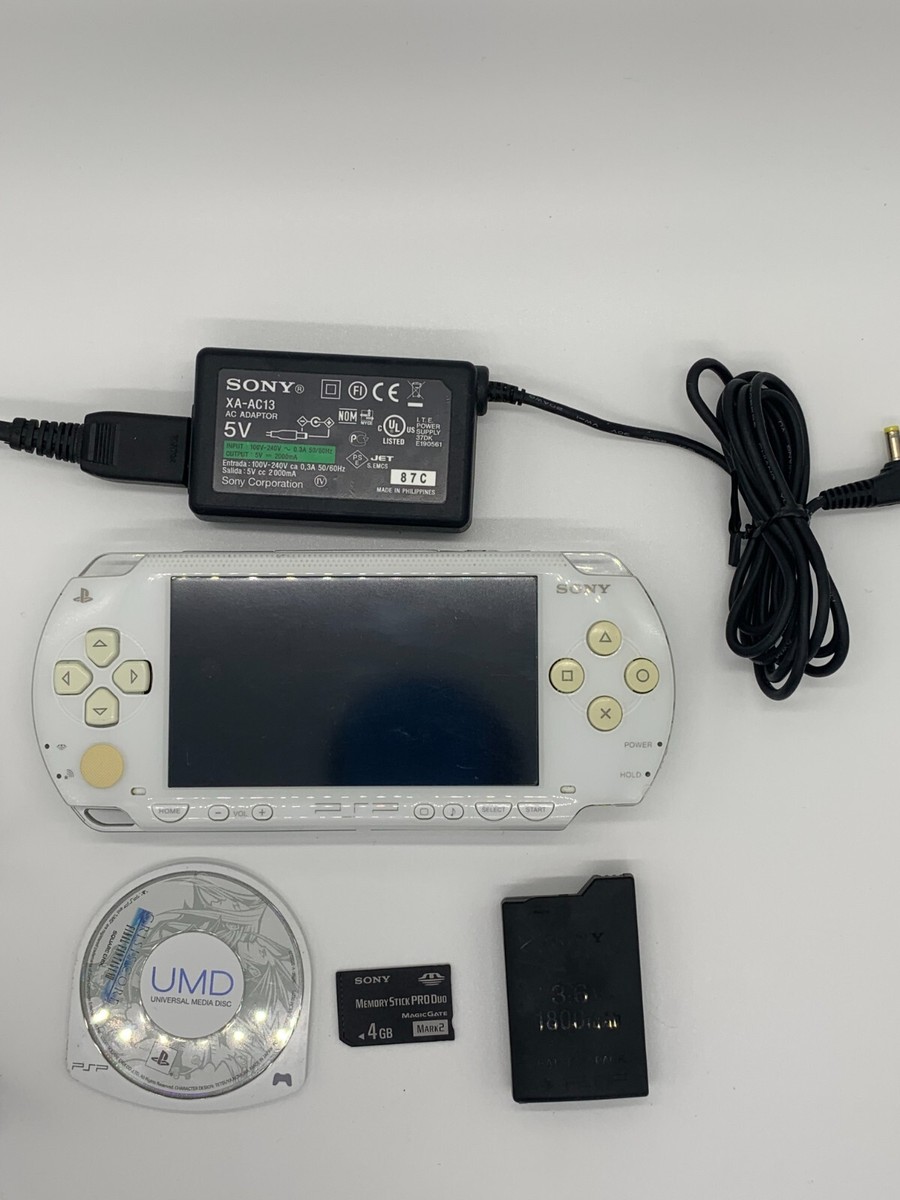 Sony PSP 1000 White - 4GB Memory stick, battery, UMD, Charger 