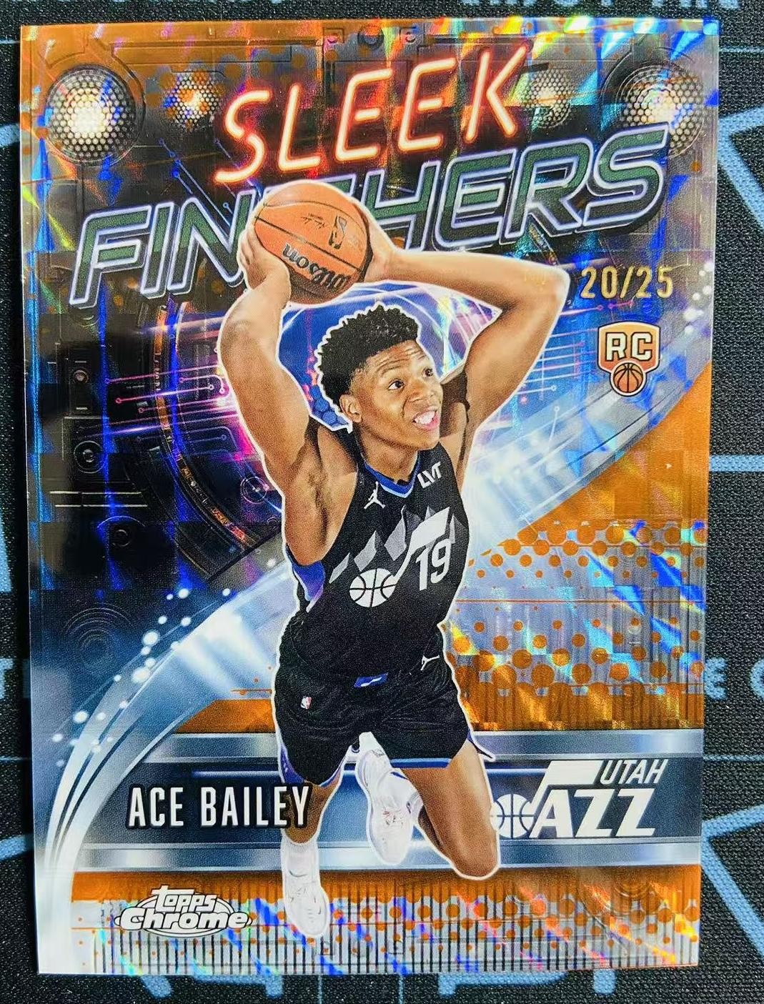 2025-26 Topps Chrome Ace Bailey #25 RC Sleek Finishers Orange Geometric /25