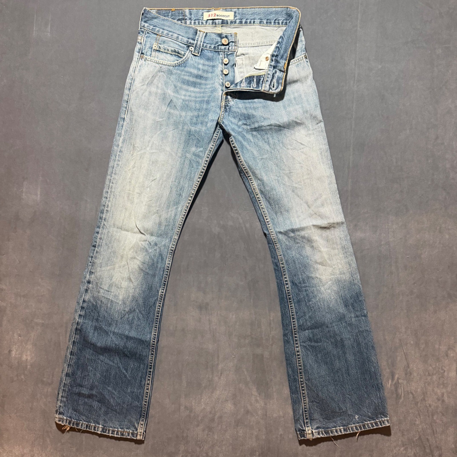 Levi's 512 Baggy Bootcut Jeans Mens 31x34 Blue Light Wash Distressed Button Fly