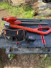 Bare Flymo Sabre Cut 24VTelescopic Cordless Hedge Trimmer .