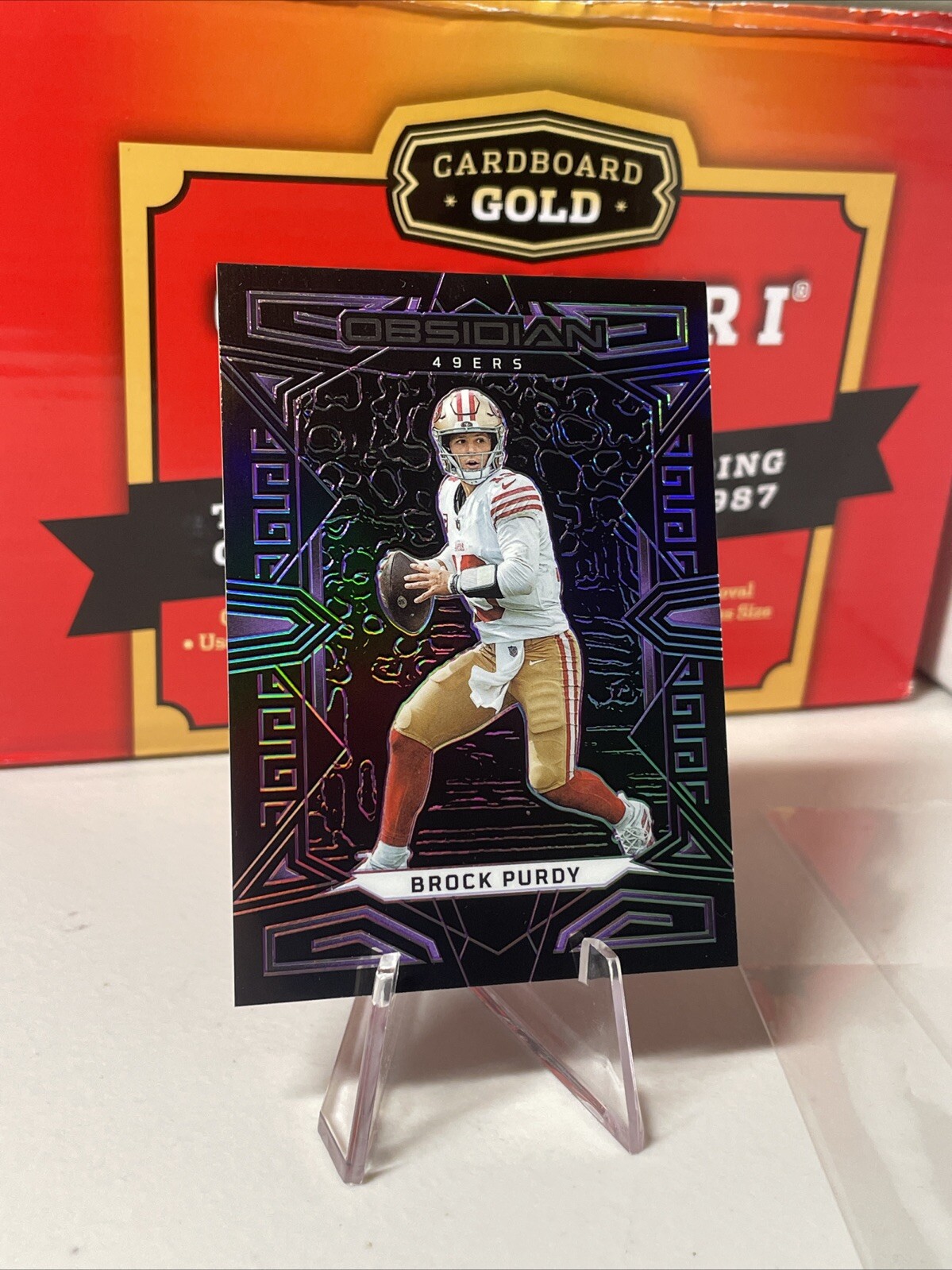 2023 Panini Obsidian - Purple Electric Etch #85 Brock Purdy /75