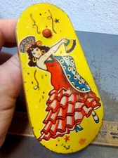 Vintage US metal toy company noise maker, Flamenco dancer, colorful graphics