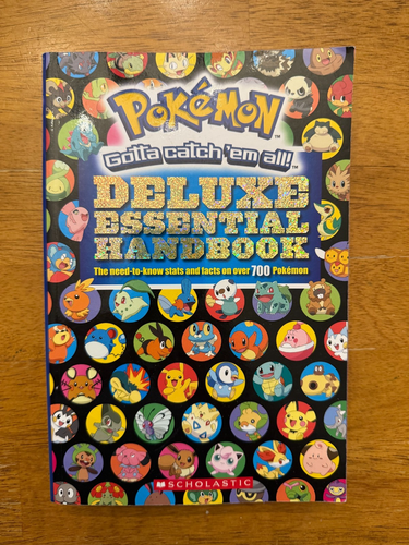 Pokemon Deluxe Essentials Handbook - Scholastic Soft Cover, Gotta Catch 'em all