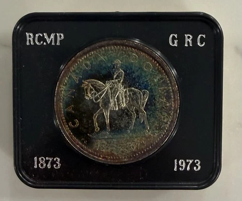 1873-1973 Canada Silver Dollar - RCMP 100th Anniversary MONSTER TONING ON REV