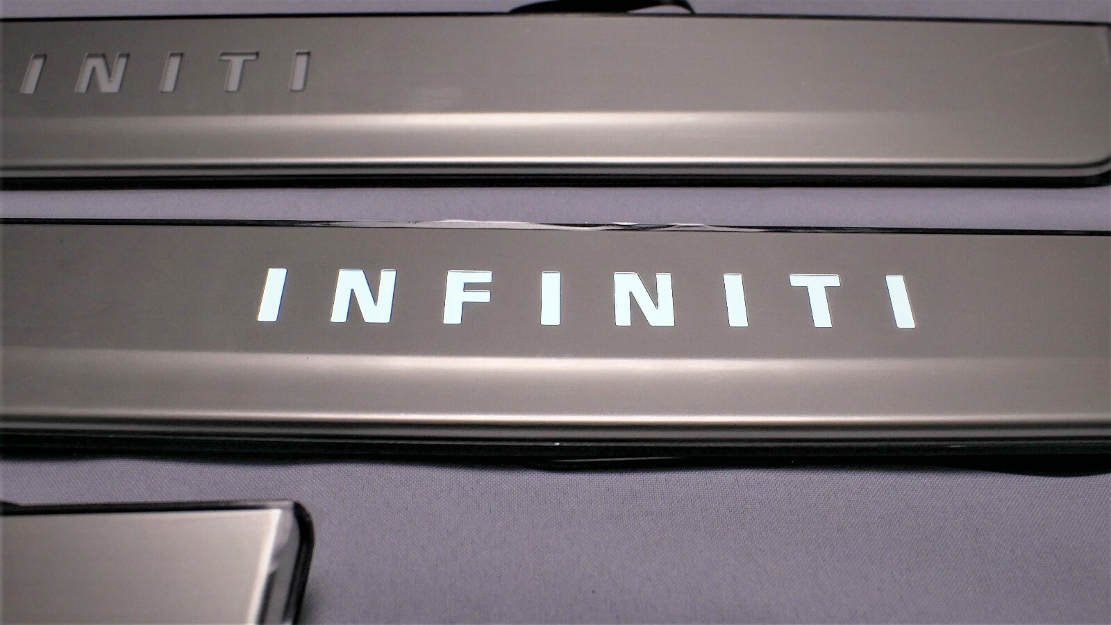 NEW OEM INFINITI QX80 RADIANT ILLUMINATED DOOR SILL KICK PLATES 999G6