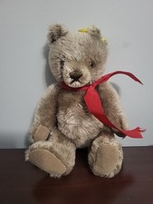 Vtg Steiff Mohair Bear 0202/18 color is caramel with brass button  yellow tag.