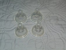 FOUR NEW MEDELA SLOW FLOW WIDE BOTTLE COLLAR NIPPLES - FREE SHIPPING