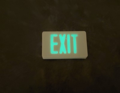 Small Green & White Emergency Exit Sign – 8cm Self-Adhesive Plastic Business Sign