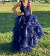 ellie wilde prom dress worn twice. Altered but can be undone.