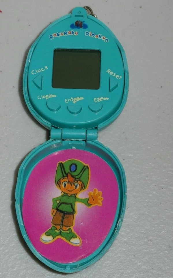 RakuRaku Dinokun dinkie dino egg Virtual Pet Giga Pets tamagotchi digimon - image 1 of 4