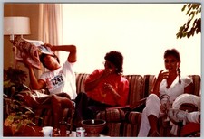 Vtg Color Snapshot Group Relaxing On Striped Couch Man With Race Bib 4247 1990s
