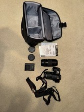 Canon EOS Rebel T7 DSLR Camera with 18-55mm and 75-300mm Lenses Includes Bag