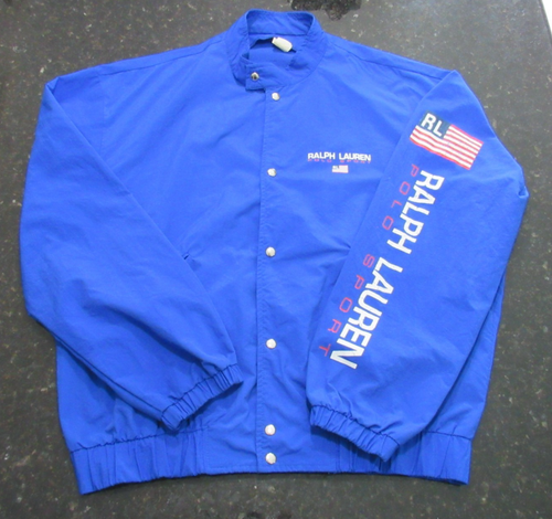 Blue Vtg 90s Polo Sport Ralph Lauren jacket with red, white, and blue diagonal stripes and visible “RL” logo.