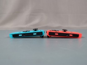 Nintendo Switch Console 32GB Handheld 720p w/ Neon Red/Blue Joy-Con HAC-001