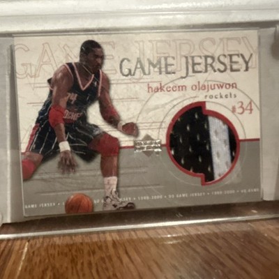 Upper Deck 1999-00 Game Jersey Hakeem Olajuwon GJ42 Insert Rockets Card