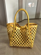 Camomilla borsa donna gialla plastica intrecciata con astuccio