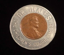 1956-D Encased Lincoln Cent - Dr. Drake's The Children's  Cough Remedy SG-691