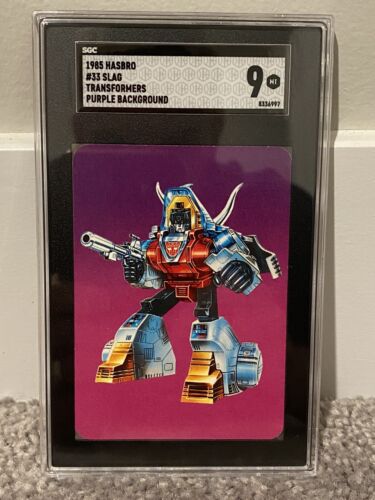 Fond violet slag - 1985 Hasbro Transformers #33 - SGC 9 - Photo 1 sur 2
